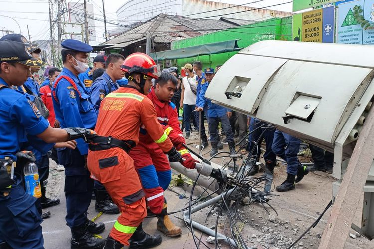 At least ten people, including four young children, were killed and more than 20 injured when a truck ploughed into a bus stop outside a school in Bekasi near Jakarta on Wednesday, Aug. 31, 2022.  
