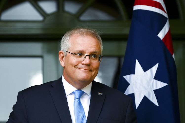 A file photo of Australian Prime Minister Scott Morrison discusses travel restrictions during a press conference in Canberra dated Oct. 1, 2021. (Lukas Coch/AAP Image via AP)