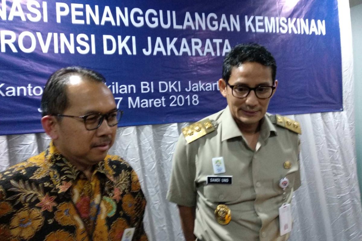 Kepala Perwakilan Bank Indonesia Provinsi DKI Jakarta Trisno Nugroho bersama Wakil Gubernur DKI Jakarta Sandiaga Uno di Kantor Perwakilan Bank Indonesia Provinsi DKI Jakarta, Selasa (27/3/2018).