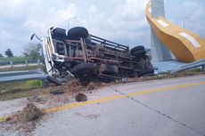 Melaju dengan Kecepatan Tinggi, Truk Boks Ekspedisi Terguling Usai Tabrak Pembatas Jalan di Tol Madiun