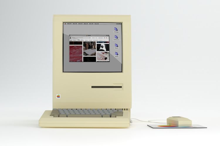 Ilustrasi komputer jadul berwarna beige.