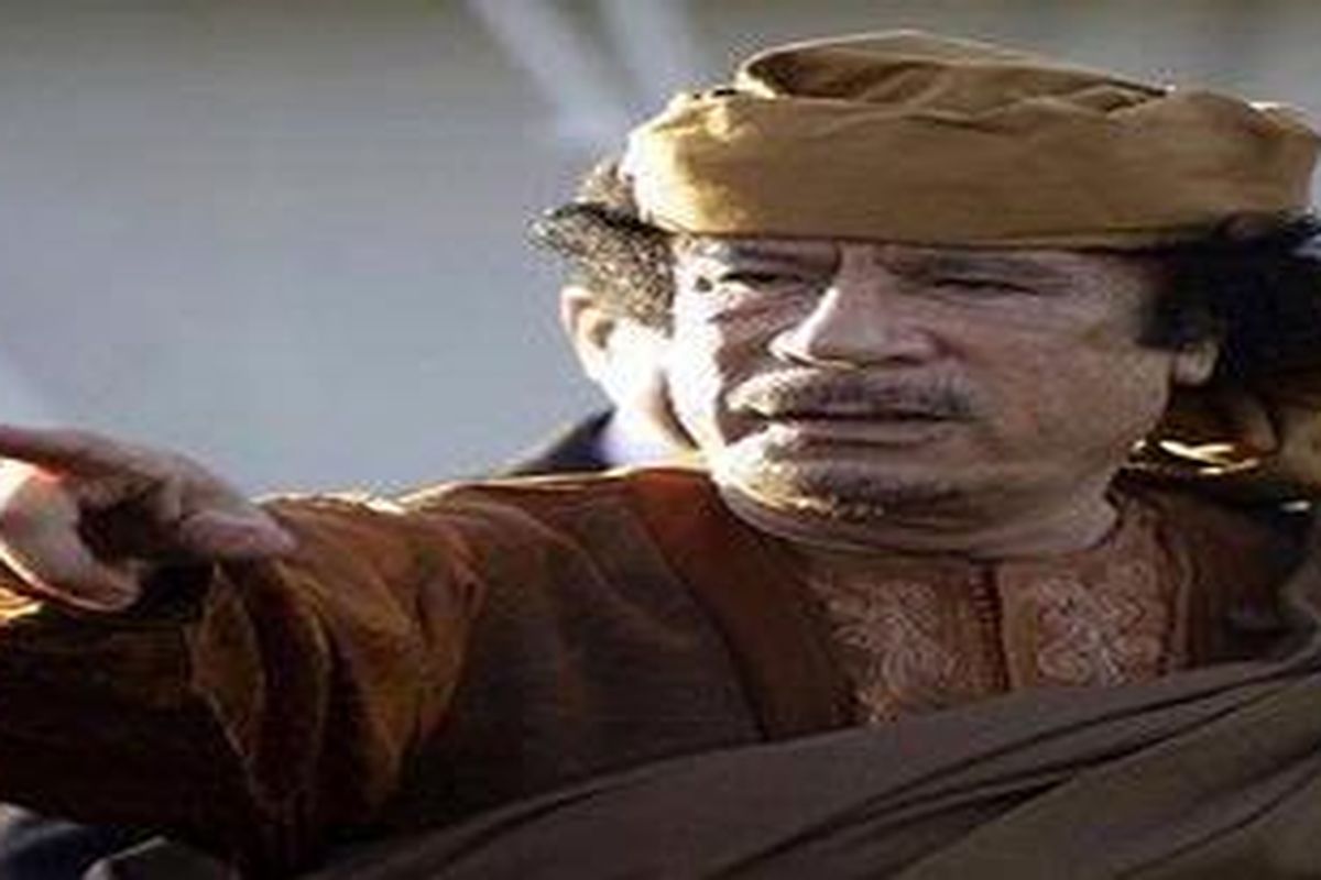 Defiant: Gaddafi announced in a speech on state TV that, despite the onslaught, he would fight to the end  