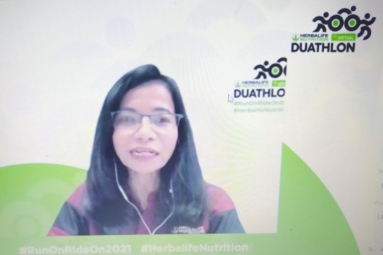Tangkapan layar Head of Marketing Herbalife Nutrition Indonesia Elfrida Viesta Napitupulu dalam jumpa pers daring  Herbalife Nutrition Virtual Duathlon 2021, Jumat (11/12/2021).