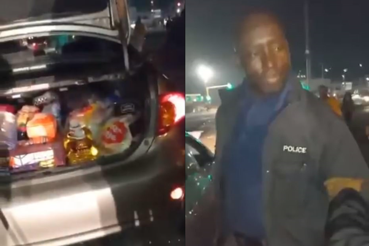 Tangkap layar video menunjukkan warga menangkap basah seorang pria yang mengenakan jaket polisi di samping mobil yang diisi dengan perlengkapan rumah tangga, termasuk roti, susu, dan minyak goreng. 