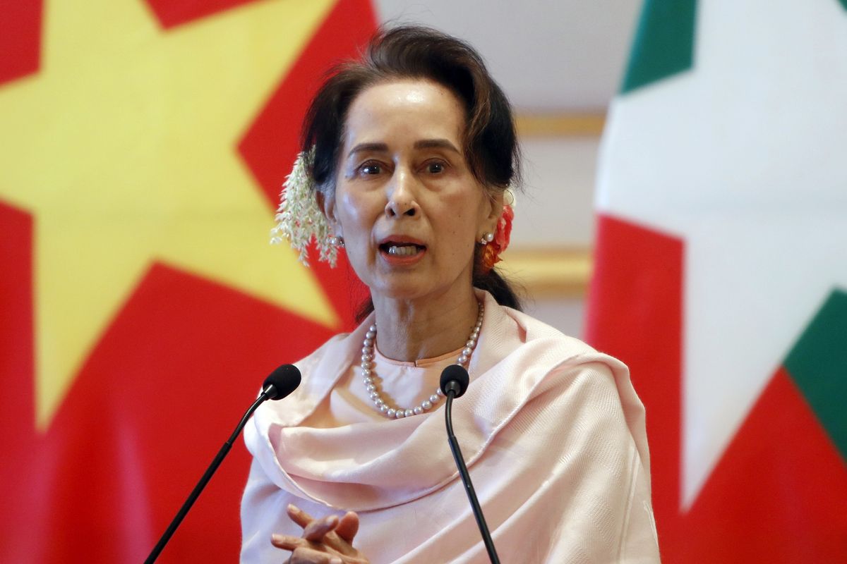 FILE - In this Dec. 17, 2019, file photo, Myanmar's leader Aung San Suu Kyi speaks during a joint press conference with Vietnam's Prime Minister Nguyen Xuan Phuc after their meeting at the Presidential Palace in Naypyitaw, Myanmar. Reports says Monday, February 1, 2021 a military coup has taken place in Myanmar and Suu Kyi has been detained under house arrest. (AP Photo/Aung Shine Oo, File)