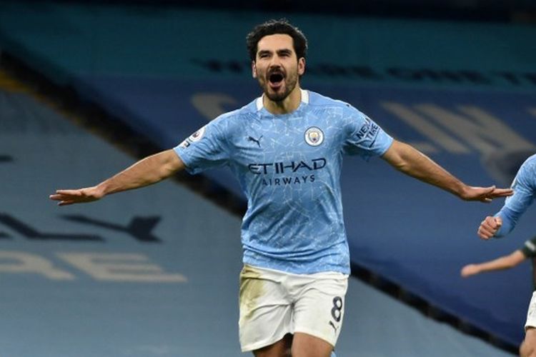 Gelandang Manchester City, Ilkay Guendogan, merayakan gol ke gawang Tottenham Hotspur pada lanjutan laga Liga Inggris di Stadion Etihad, Minggu (14/2/2021) dini hari WIB.