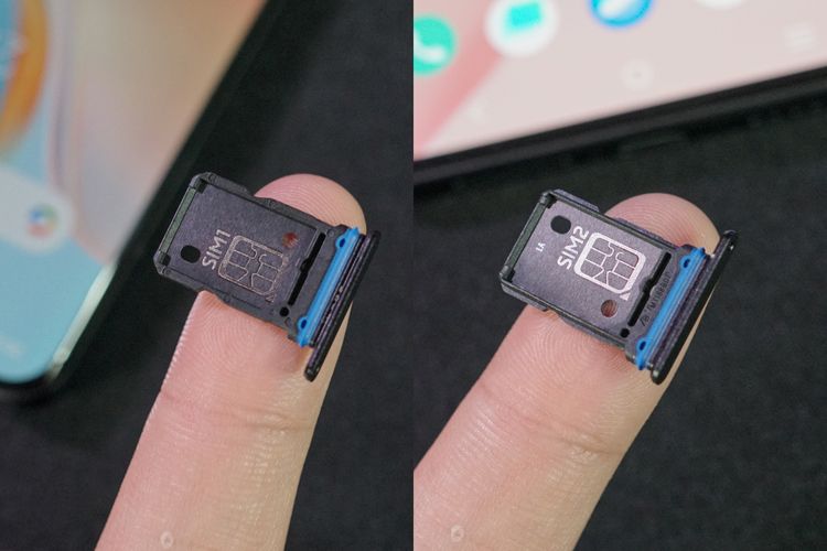 Laci SIM card Vivo X70 Pro mampu memuat dua kartu SIM tipe nano dalam posisi saling membelakangi, tapi tak ada tempat untuk kartu memori microSD
