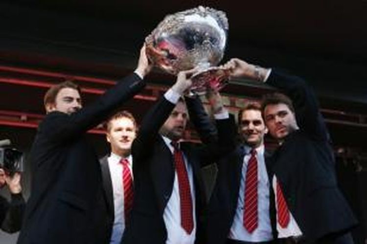 Tim Swiss merayakan kemenangan setelah mengalahkan Perancis pada final Piala Davis 2014.