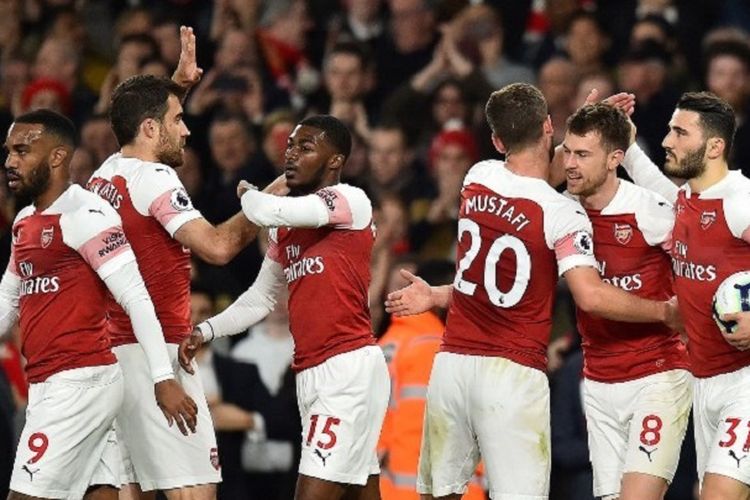 Aaron Ramsey merayakan gol yang dicetaknya pada laga Arsenal vs Newcastle United dalam lanjutan Liga Inggris di Stadion Emirates, 1 April 2019. 