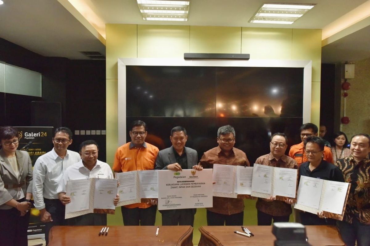 Penandatangan MoU pegadaian dengan 5 Perusahaan dan satu Lembaga pemerintah untuk Kembangkan Produk dan Layanan