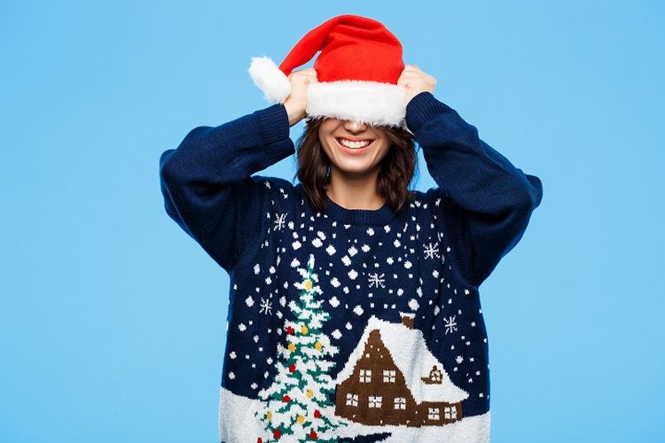 Ilustrasi sweater Natal berbahan wol.