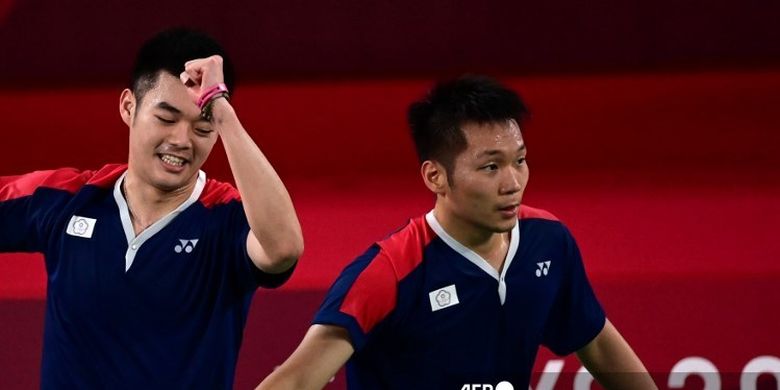 Ganda putra Taiwan Lee Yang/Wang Chi-lin setelah menang atas wakil Jepang dan memastikan tiket semifinal badminton Olimpiade Tokyo 2020.
