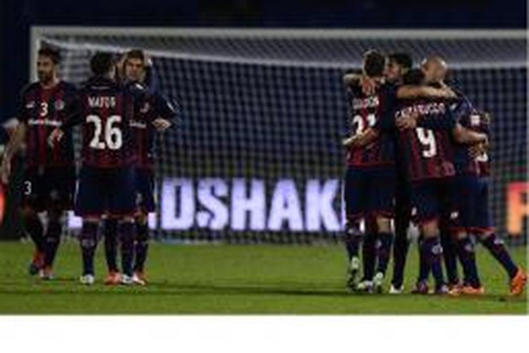 Para pemain San Lorenzo merayakan kesuksesan mereka mengalahkan Auckland City pada laga semifinal Piala Dunia Antarklub di Marrakesh stadium, Marrakesh, Rabu (17/12/2014). San Lorenzo menang 2-1 dan akan bertemu Real Madrid di final.