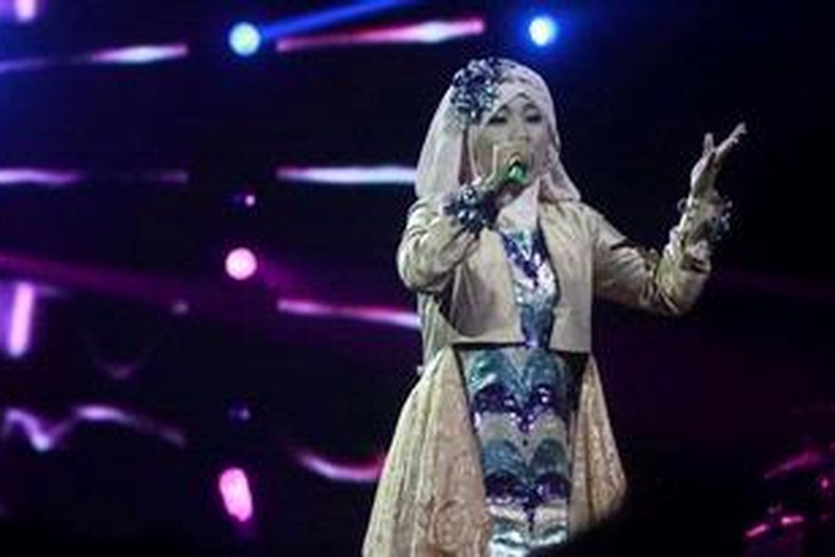 Satu dari dua peserta Grand Final X Factor Indonesia, Fatin Shidqia Lubis, tampil pada Result Show X Factor Indonesia, di Hall D JIExpo, Kemayoran, Jakarta Pusat, Jumat (24/5/2013) malam.