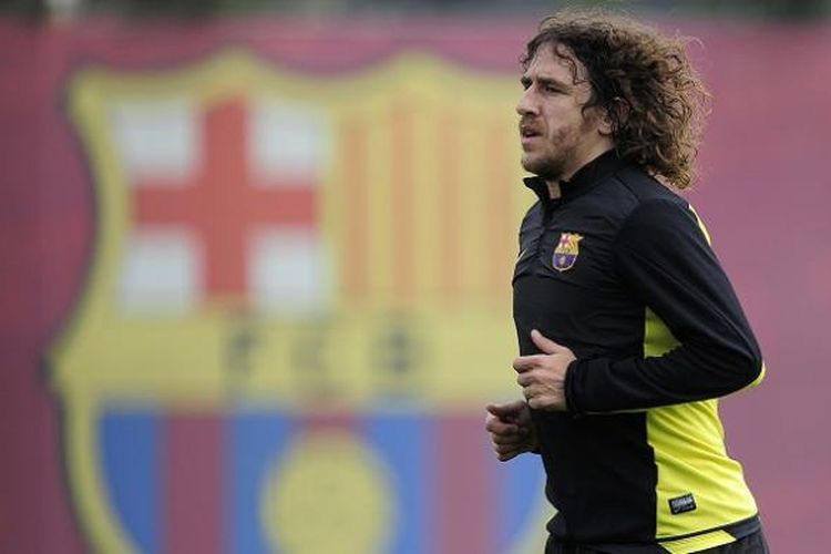 Mantan kapten Barcelona, Carles Puyol, kala masih aktif berkarier sebagai pesepak bola. Puyol gantung sepatu pada akhir musim 2013-2014.