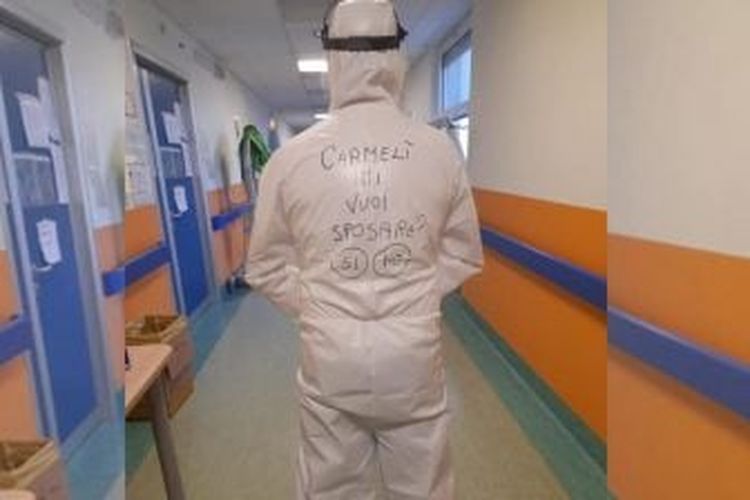 Giuseppe Pungente perawat Covid-19 di Italia yang melamar kekasihnya dengan tulisan di baju hazmat. Fotonya viral pada Sabtu (2/1/2020).