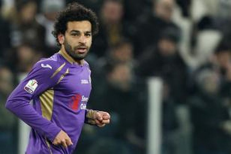 Salah satu ekspresi gelandang Fiorentina, Mohamed Salah, pada pertandingan leg pertama semifinal Piala Italia, di Juventus Stadium, Turin, Kamis (5/3/2015). Salah mencetak dua gol yang menentukan kemenangan Fiorentina 2-1.