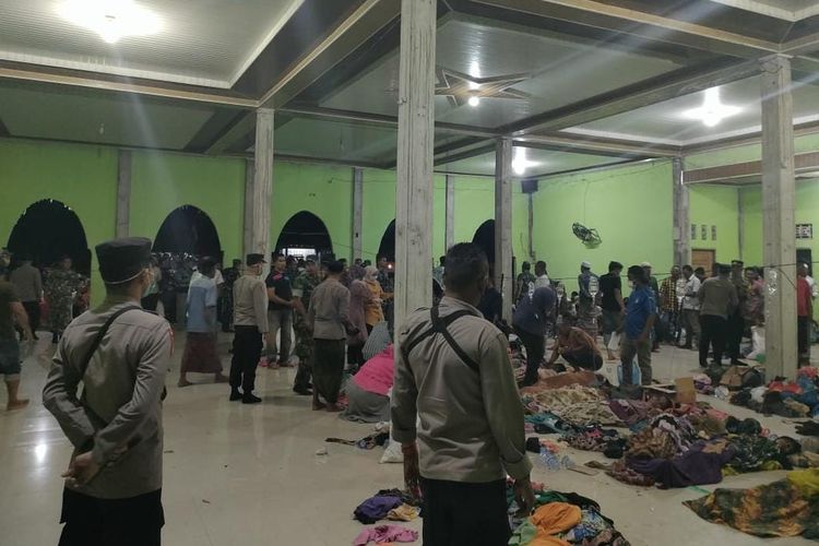 Some 185 Rohingya refugees receive treatment at a shelter located in a school complex after they landed in Gampong Pie Beach, Pidie district in Aceh. 