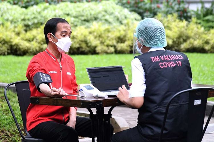 President Joko Widodo gets his second dose of Covid-19 vaccine at Merdeka Palace in Jakarta on Wednesday, January 27. 