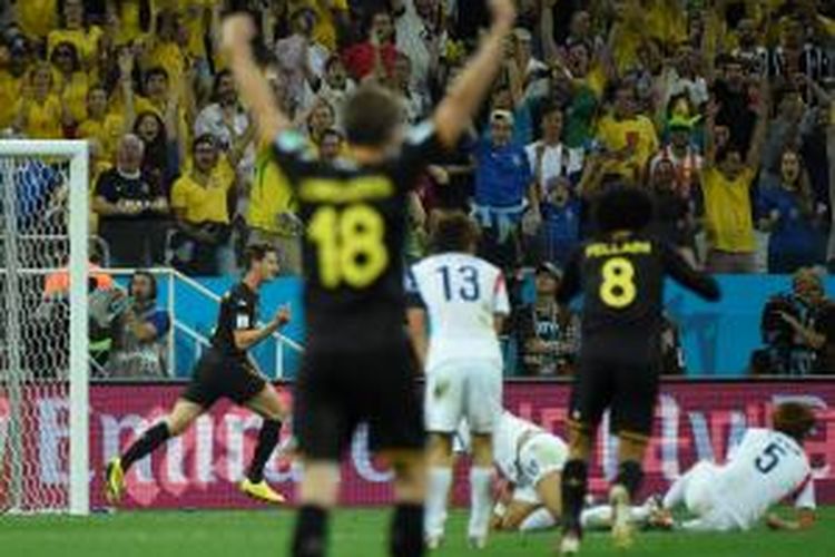 Bek tim nasional Belgia, Jan Vertonghen, seusai mencetak gol ke gawang Korea Selatan pada pertandingan terakhir Grup H Piala Dunia 2014 di Arena de Sao Paulo, Kamis atau Jumat (27/6/2014) dini hari WIB. Belgia menang 1-0 pada laga tersebut. 