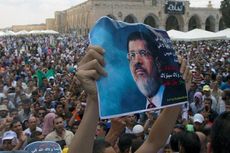Puluhan Ribu Pendukung Mursi Turun ke Jalanan Kairo