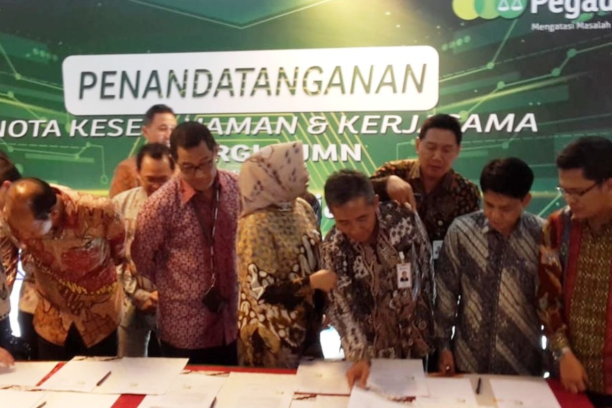 Kerjasama antara PT Pegadaian (Persero) dengan 10 BUMN di Kementerian BUMN, Jakarta, Senin (30/9/2019)