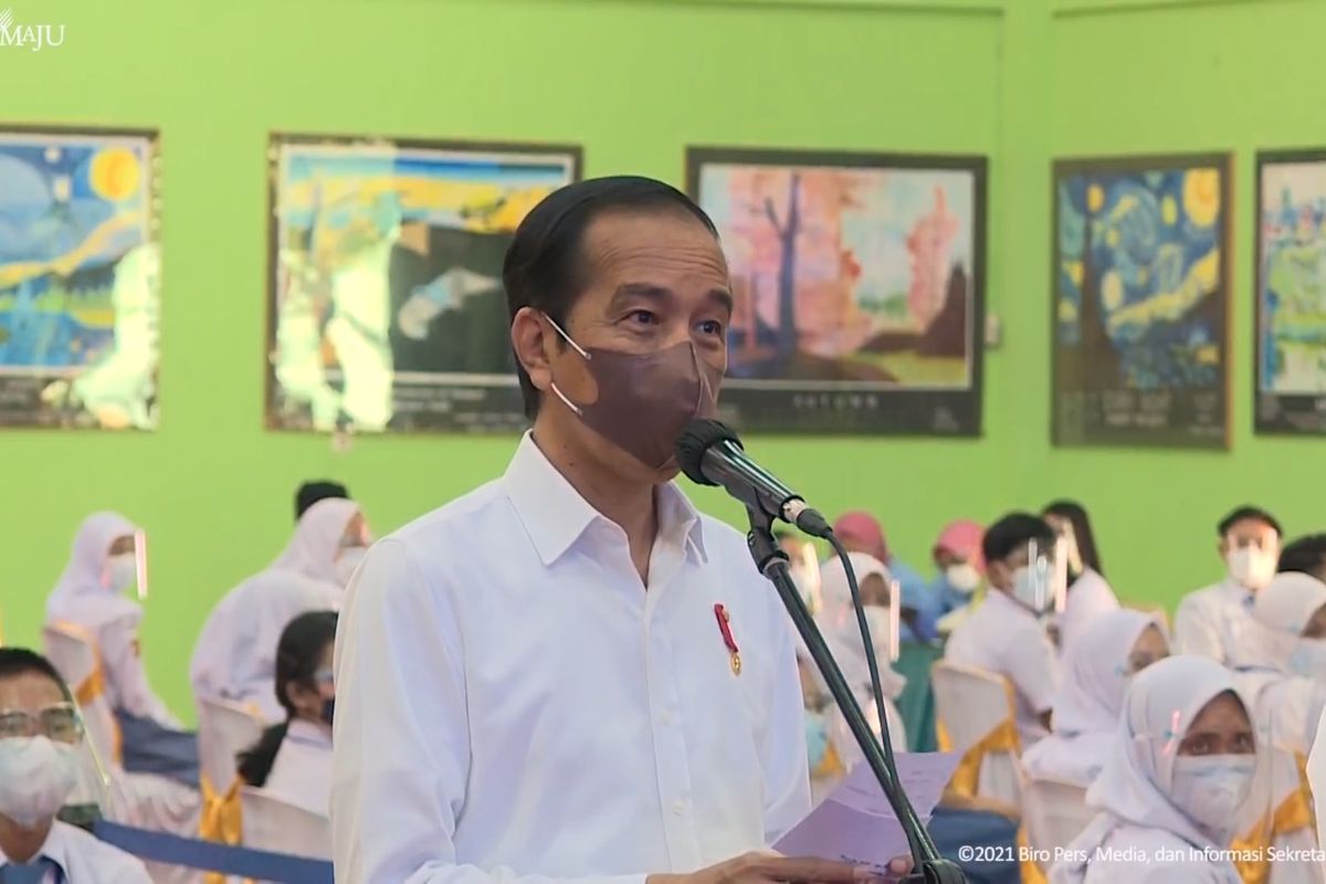 Screen grab of Indonesia's President Joko Widodo visiting a Covid-19 vaccination center in a Lampung high school on Thursday, September 2, 2021.    