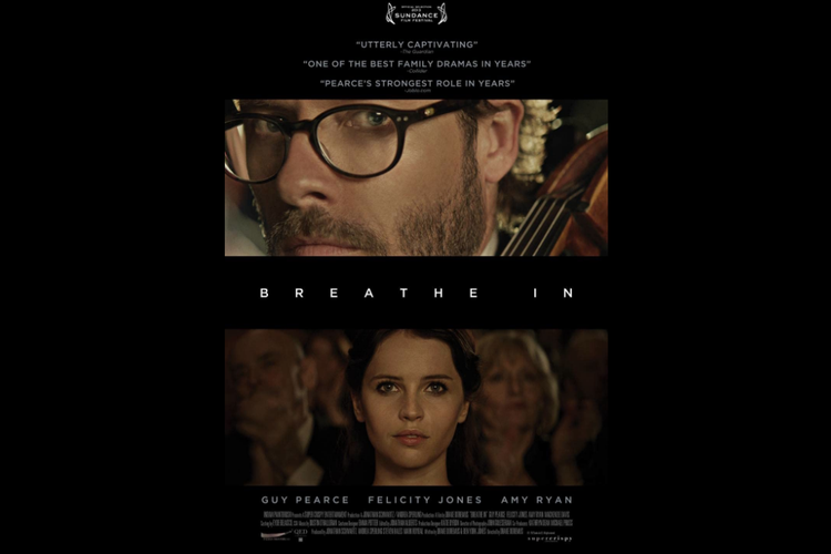Guy Pearce dan Felicity Jones dalam film drama romantis Breathe In (2013).