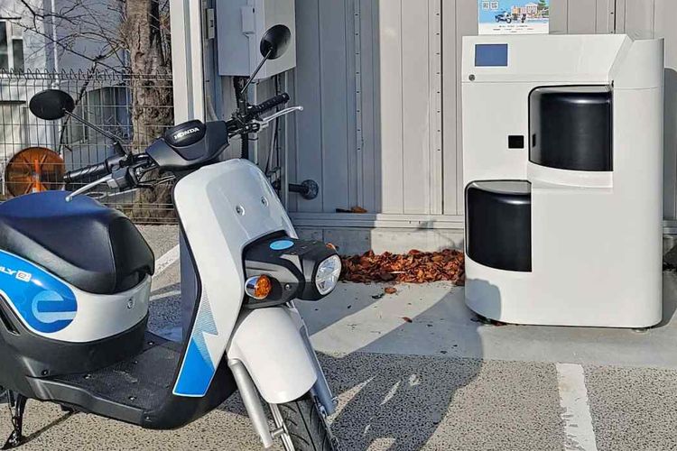 Ilustrasi stasiun penukaran baterai motor listrik