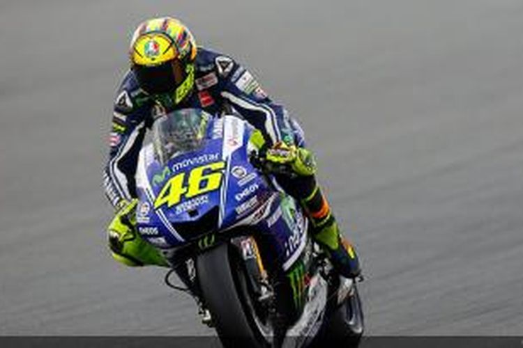 Pebalap Movistar Yamaha asal Italia, Valentino Rossi, membalap di Sirkuit Indianapolis Motor Speedway pada sesi latihan bebas pertama GP Indianapolis, Jumat (8/8/2014).