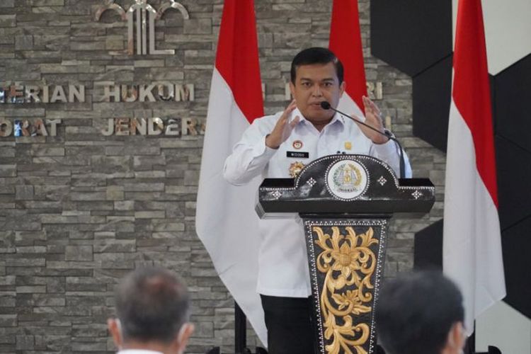 Immigration Acting Director General at the Law and Human Rights Ministry Widodo Ekatjahjana speaks during an event.
