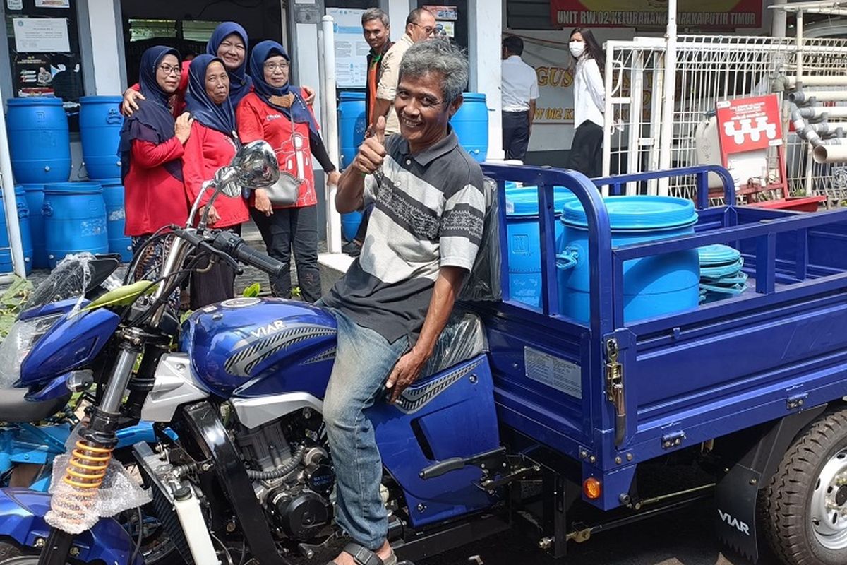 Motor gerobak sampah pemberian ASDP. 