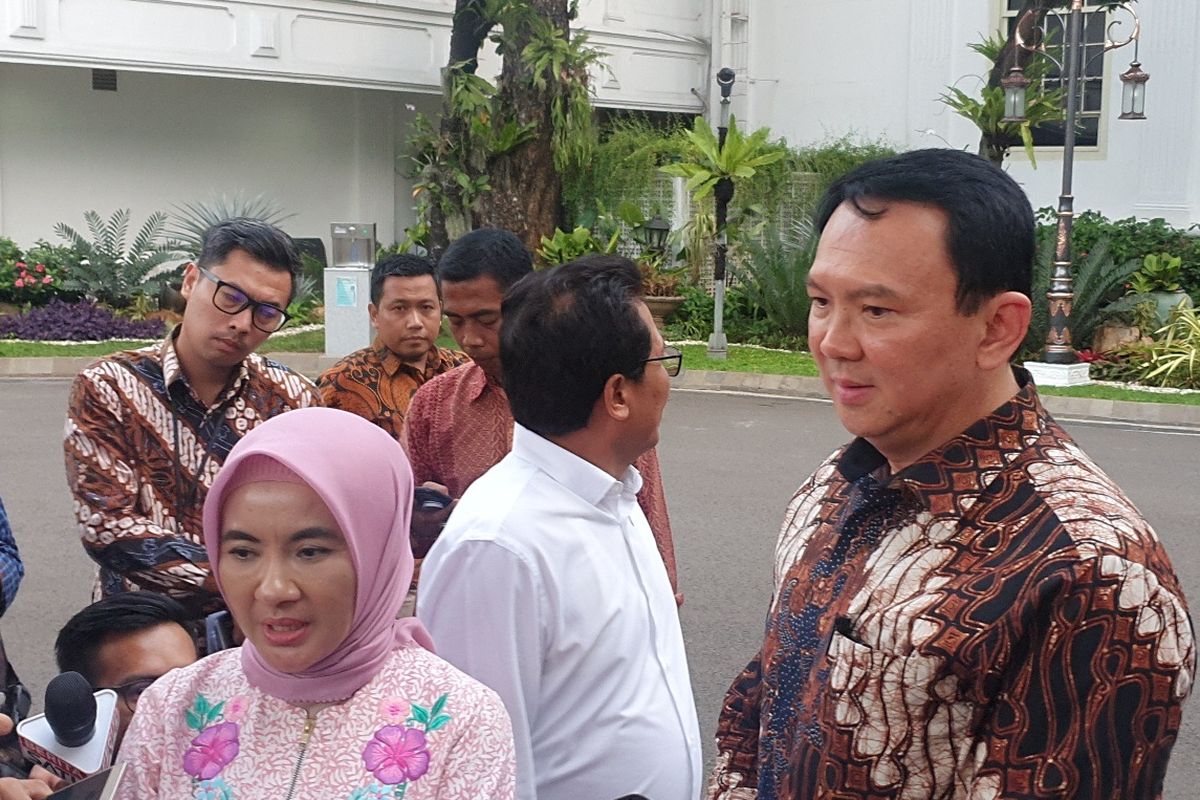 Komisaris Utama Pertamina Basuki Tjahaja Purnama alias Ahok bersama DIrut Pertamina Nicke Widyawati  usai bertemu Presiden Joko Widodo di Istana Kepresidenan, Jakarta, Senin (9/10/2019).