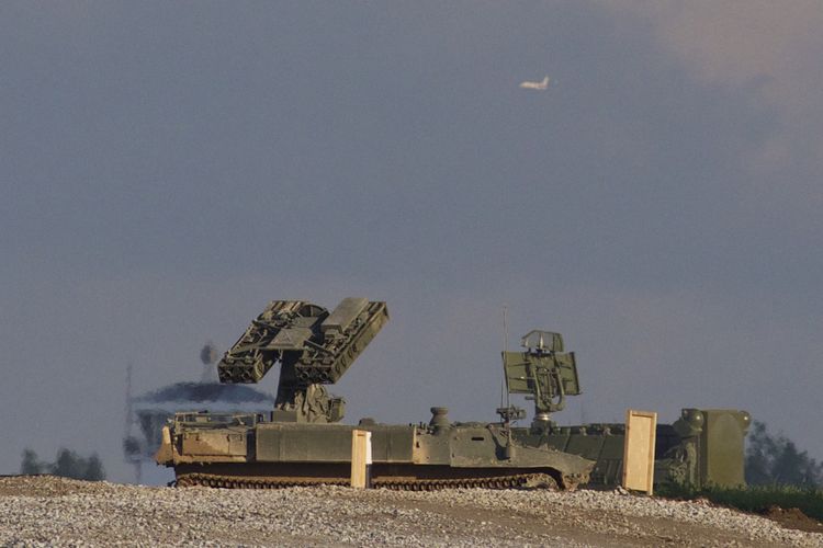 Russia's STRELA 10 anti-aircraft missile launcher prepares during the Army-2015 military exhibition at the Alabino firing range, outside Moscow, Russia, Tuesday, June 16, 2015.