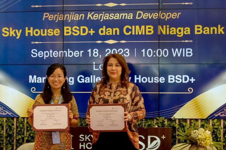 Direktur Finance Risland dan Mortgage Head Sales CIMB Niaga menandatangani Kerjasama. 