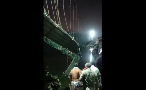 India Bridge Collapses, Killing at Least 130 People