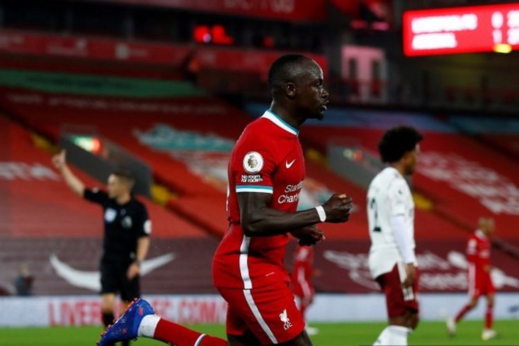 Penyerang Liverpool, Sadio Mane, membobol gawang Arsenal pada pekan ketiga Liga Inggris 2020-2021.