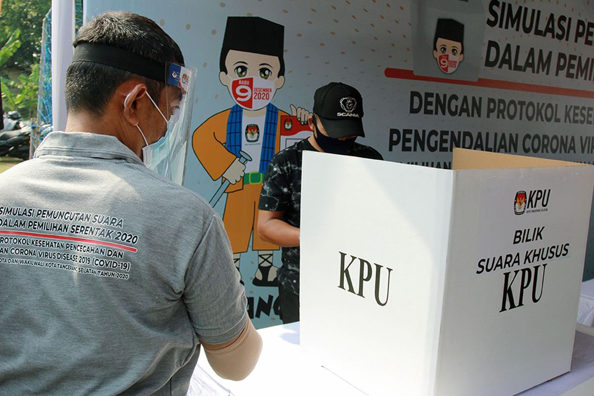 A file photo of voting simulation for the regional polls during the Covid-19 pandemic at a polling station in South Tangerang in Banten, West Java. 