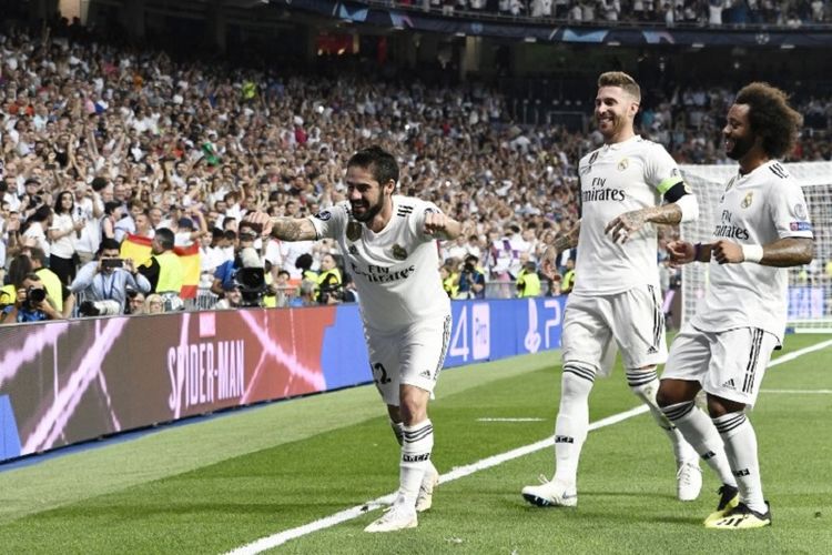 Isco merayakan golnya bersama Sergio Ramos dan Marcelo pada pertandingan Real Madrid vs AS Roma dalam matchday 1 Liga Champions di Stadion Santiago Bernabeu, 19 September 2018. 