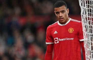 Penyerang Manchester United, Mason Greenwood, saat beraksi di ajang Liga Inggris 2021-2022. Pada Minggu (30/1/2022), pacar Greenwood mengunggah video dan foto-foto yang mengklaim dirinya mendapat kekerasan domestik dari sang pemain.