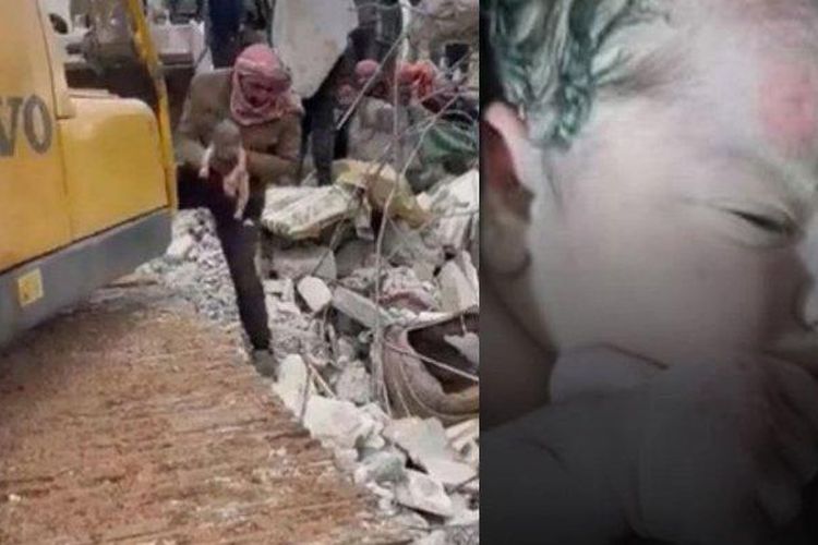 Tangkapan layar video yang menunjukkan seorang bayi baru lahir ditemukan selamat di bawah puing-puing bangunan yang roboh akibat gempa di Kota Jindayris, Suriah utara pada Senin (6/2/2023).