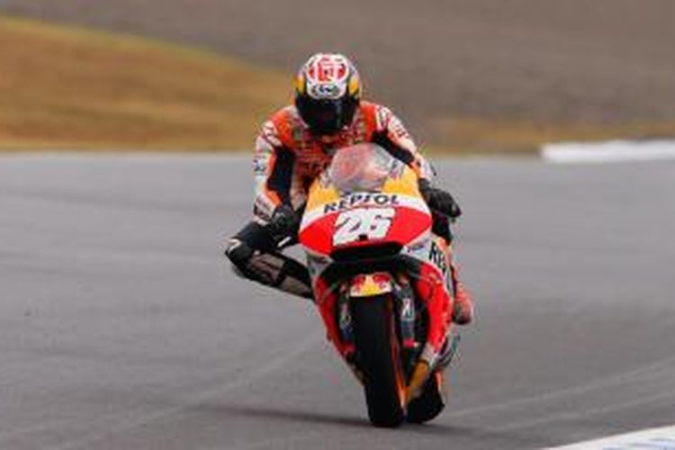 Pebalap Repsol Honda asal Spanyol, Dani Pedrosa, memacu motornya pada balapan GP Jepang di Sirkuit Twin Ring Motegi, Minggu (11/10/2015).