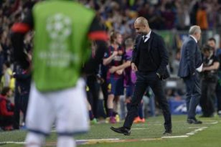 Ekspresi pelatih Bayern Muenchen, Josep Guardiola, seusai timnya takluk 0-3 dari Barcelona, pada pertandingan pertama semifinal Liga Champions, di Camp Nou, Rabu malam atau Kamis (7/5/2015) dini hari WIB. 