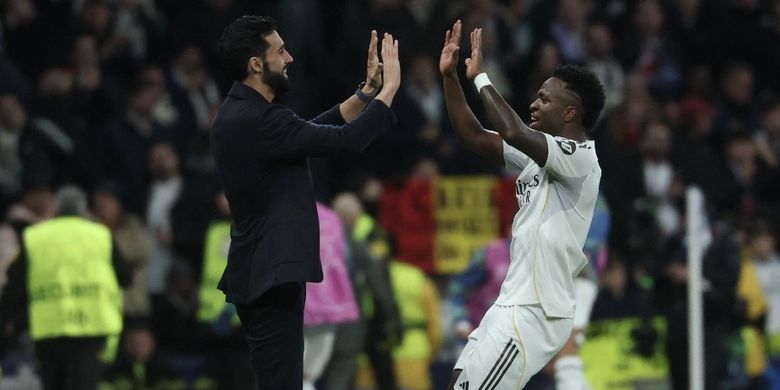 Pelatih Real Madrid Alvaro Arbeloa dan penyerang VInicius Jr merayakan gol ke gawang AS Monaco. Hasil Liga Champions Real Madrid vs AS Monaco di Estadio Santiago Bernabeu pada Rabu (21/1/2026) dini hari WIB berakhir dengan skor besar 6-1 bagi Los Blancos.