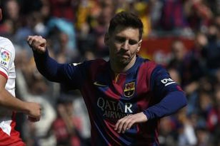 Salah satu ekspresi penyerang Barcelona Lionel Messi, pada pertandingan Primera Division melawan Rayo Vallecano, di Camp Nou, Minggu (8/3/2015). Laga itu berakhir 6-1 untuk Barcelona