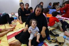 Dipaksa Pindah Agama atau Bayar Pajak, Warga Kristen Irak Tinggalkan Mosul