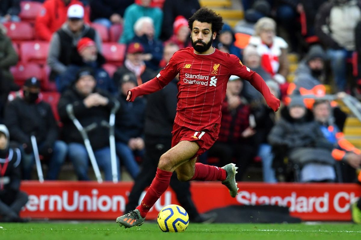 Penyerang Liverpool, Mohamed Salah, beraksi saat melawan Watford di Stadion Anfield, Sabtu (14/12/2019).