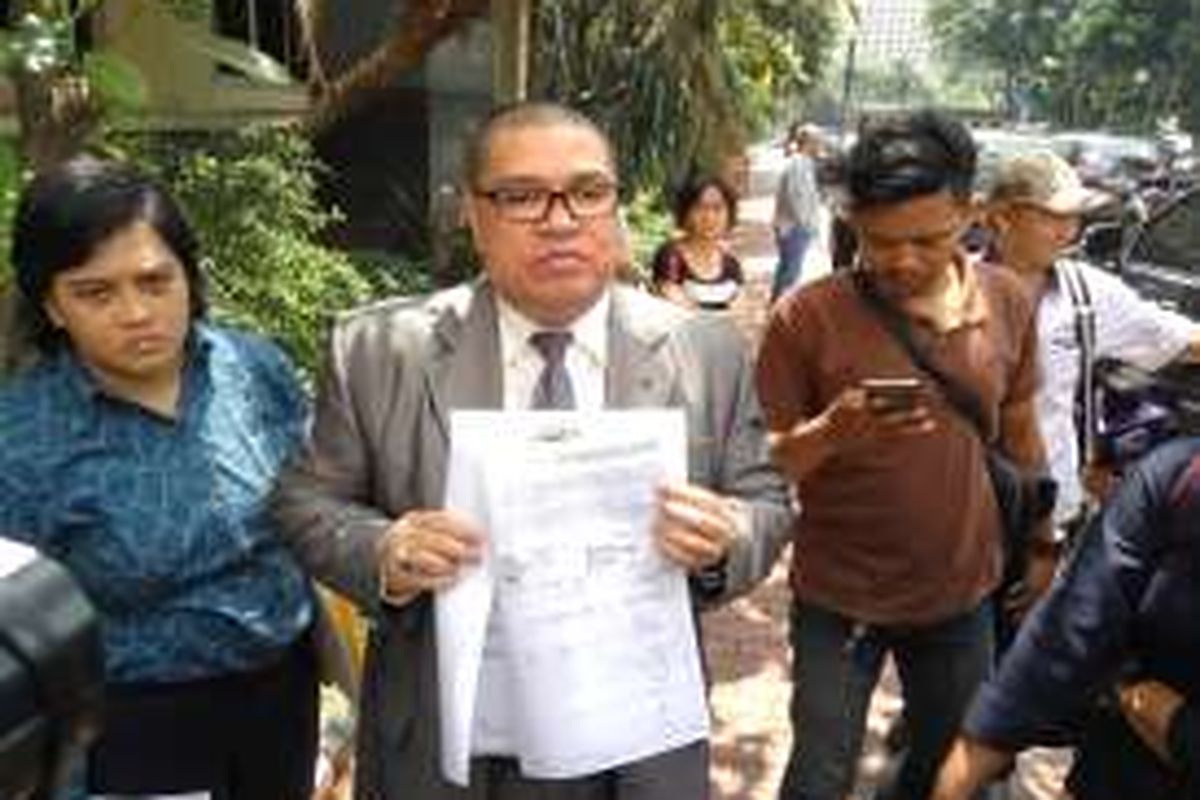 Penasihat hukum, Razman Arif Nasution Saat Menyambangi Mapolda Metro Jaya, Senin (11/4/2016).
