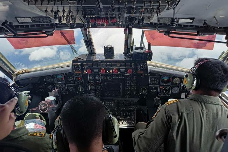 BPPT and Indonesian Air Force or TNI AU personnel fly over the Sunda Straits with tons of salt to divert rains from the Jakarta the this area