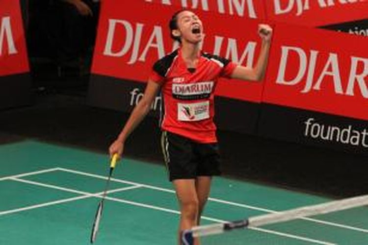 Pemain tunggal putri Djarum Kudus, Maria Febe Kusumastuti, berteriak setelah menang atas Ayumi Mine dari Renesas Jepang, pada laga terakhir babak penyisihan Grup D Djarum Superliga Badminton 2015 di Denpasar, Kamis (29/1/2015).